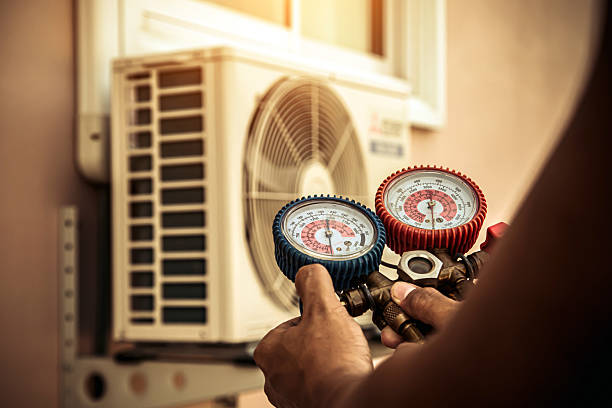Professional Hvac technician working in Telogia, FL